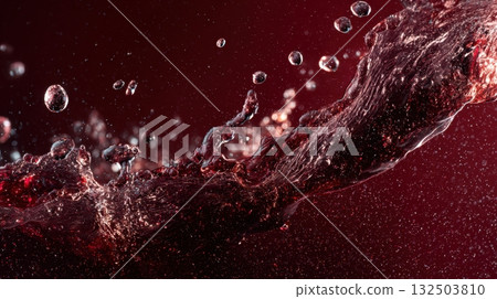 Red liquid splashes wildly 132503810