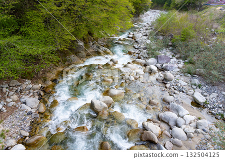 Achi River flows through the village of Hanamomo in Achi Village, Nagano Prefecture Achi River flows through the village of Hanamomo in Achi Village, Nagano Prefecture 132504125