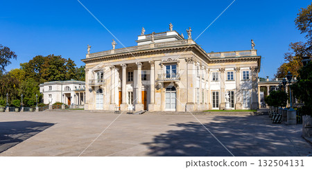Lazienki Palace on island inside Lazienki Park panorama in Warsaw, Poland Lazienki Palace on island inside Lazienki Park panorama in Warsaw, Poland 132504131