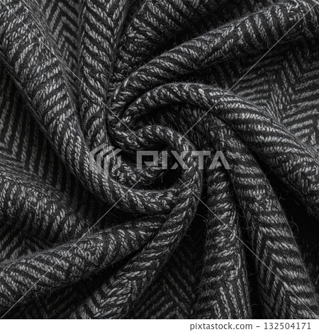 Luxurious drape texture of wool herringbone fabric in monochrome 132504171