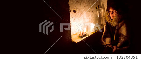 Old woman hiding in bombshelter cellar Old woman hiding in bombshelter cellar 132504351