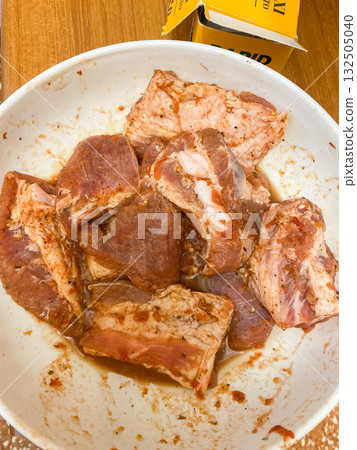 Tender pork skewers are ready for grilling. 132505040