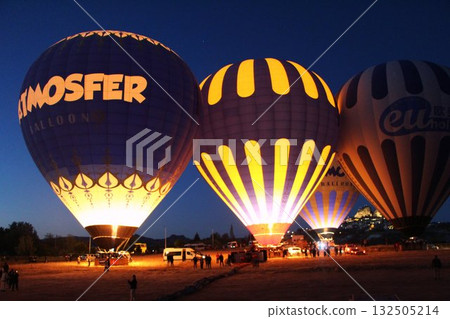 Cappadocia balloons flying from early morning before dawn to sunrise, Cappadocia scenery Cappadocia balloons flying from early morning before dawn to sunrise, Cappadocia scenery 132505214
