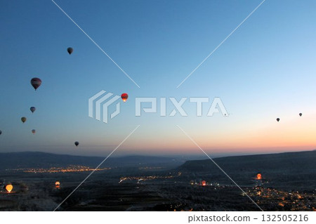 Cappadocia balloons flying from early morning before dawn to sunrise, Cappadocia scenery 132505216
