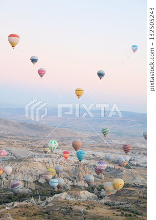 Cappadocia balloons flying from early morning before dawn to sunrise, Cappadocia scenery Cappadocia balloons flying from early morning before dawn to sunrise, Cappadocia scenery 132505243