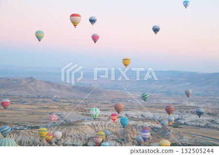 Cappadocia balloons flying from early morning before dawn to sunrise, Cappadocia scenery 132505244