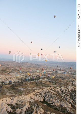 Cappadocia balloons flying from early morning before dawn to sunrise, Cappadocia scenery Cappadocia balloons flying from early morning before dawn to sunrise, Cappadocia scenery 132505245