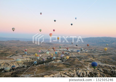 Cappadocia balloons flying from early morning before dawn to sunrise, Cappadocia scenery Cappadocia balloons flying from early morning before dawn to sunrise, Cappadocia scenery 132505246