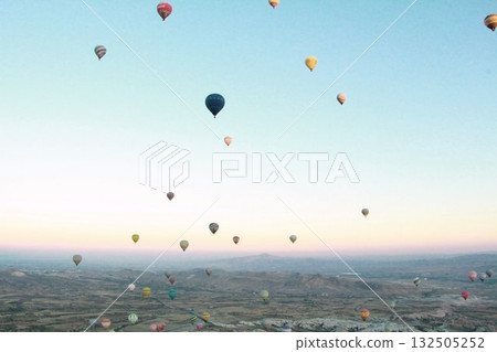 Cappadocia balloons flying from early morning before dawn to sunrise, Cappadocia scenery Cappadocia balloons flying from early morning before dawn to sunrise, Cappadocia scenery 132505252