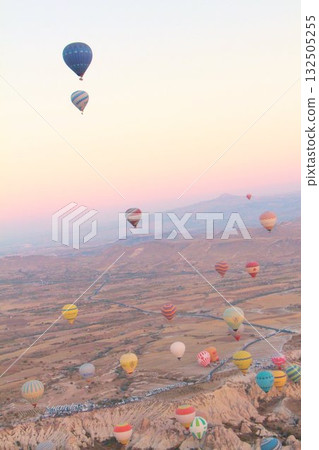 Cappadocia balloons flying from early morning before dawn to sunrise, Cappadocia scenery Cappadocia balloons flying from early morning before dawn to sunrise, Cappadocia scenery 132505255