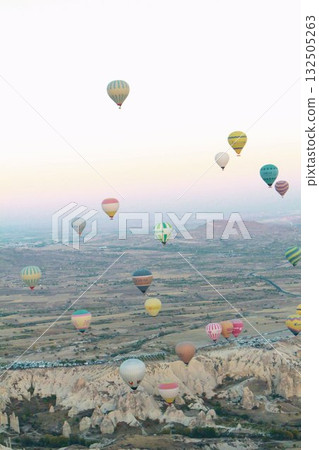 Cappadocia balloons flying from early morning before dawn to sunrise, Cappadocia scenery Cappadocia balloons flying from early morning before dawn to sunrise, Cappadocia scenery 132505263