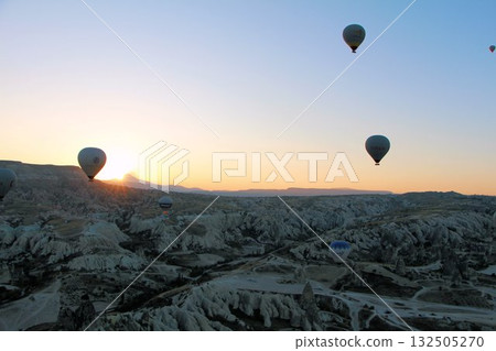 Cappadocia balloons flying from early morning before dawn to sunrise, Cappadocia scenery Cappadocia balloons flying from early morning before dawn to sunrise, Cappadocia scenery 132505270
