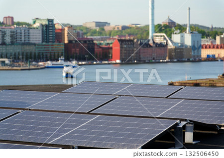 Solar panels on roof of apartment building, renewable green sustainable energy concept, water cooling, aerial view, Gothenburg, Sweden 132506450