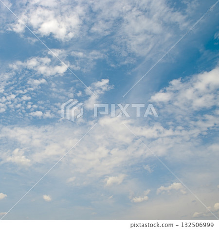 Dramatic Sky with Scattered Clouds in Blue Atmosphere Offering Natural Patterns and Open Copy Space for Background or Design Concepts Dramatic Sky with Scattered Clouds in Blue Atmosphere Offering Natural Patterns and Open Copy Space for Background or Design Concepts 132506999