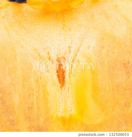 Close up texture of fresh plum slice showing juicy flesh and seed inside Close up texture of fresh plum slice showing juicy flesh and seed inside 132508053