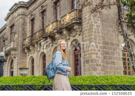 Young woman tourist standing near Chapultepec Castle in Mexico City, exploring the historic landmark. Solo travel, cultural heritage, tourism, and adventure concept Young woman tourist standing near Chapultepec Castle in Mexico City, exploring the historic landmark. Solo travel, cultural heritage, tourism, and adventure concept 132508635