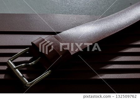 Close up of leather belts.  132509762