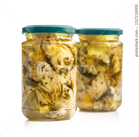 Pickled artichoke in jar isolated on white background. 132510008