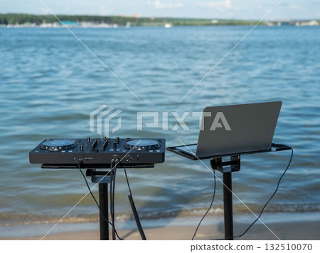 DJ equipment on the river bank.  132510070