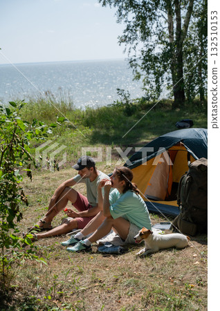 Caucasian couple on a picnic in nature.  132510153