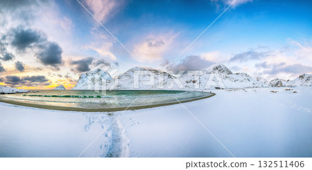 Amazing winter view of Vik and Haukland beaches during sunset with lots of snow  and snowy  mountain peaks near Leknes 132511406