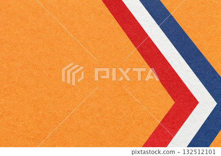Orange textured paper background with red, white, blue arrow shapes and copy space. Abstract geometric banner 132512101