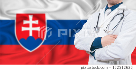 Slovakia healthcare concept. Male doctor on Slovakian flag. Doctor with crossed arms on Slovakian flag Slovakia healthcare concept. Male doctor on Slovakian flag. Doctor with crossed arms on Slovakian flag 132512623