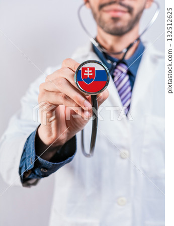 Slovakia health and medical insurance concept. Slovakia healthcare system, doctor holding stethoscope 132512625