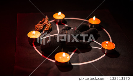 Voodoo doll on a pentagram. Witch spells. Voodoo doll on a pentagram. Witch spells. 132513370