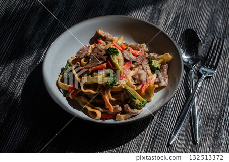 Pasta with beef, mushrooms and vegetables. Pasta with beef, mushrooms and vegetables. 132513372