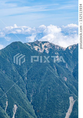 View of Jizogatake (Obelisk) of the Houou Sanzan mountains from the hut on the shoulder of Kitadake. Climbing Kitadake in the Southern Alps View of Jizogatake (Obelisk) of the Houou Sanzan mountains from the hut on the shoulder of Kitadake. Climbing Kitadake in the Southern Alps 132513934