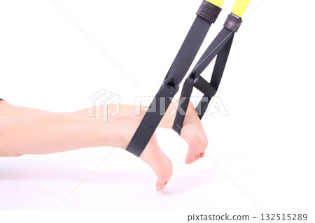 Woman doing suspension training 132515289