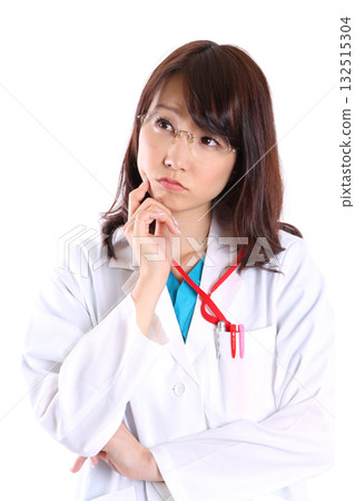 Thinking young female doctor 132515304