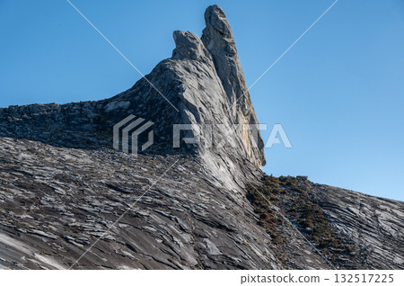 An iconic Donkey's Ear Peak on Mt Kinabalu is one of the highest mountain in South East Asia. An iconic Donkey's Ear Peak on Mt Kinabalu is one of the highest mountain in South East Asia. 132517225