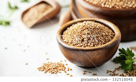 A bowl of golden sesame seeds. A bowl of golden sesame seeds. 132518048