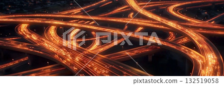 Complex highway interchange with traffic flowing at night, creating mesmerizing light trails, showcasing urban infrastructure and transportation network 132519058