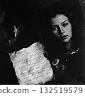 A woman breaking the paper 132519579