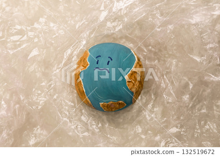 Sadness Globe wraped by Plastic materials. Environmental Issue Concept 132519672