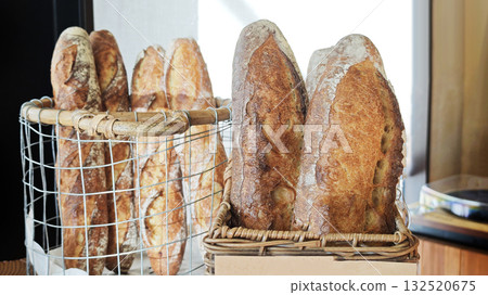 Freshly baked French bread showing texture and golden crust 132520675