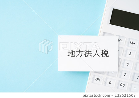 Local corporation tax lettering and calculator on a light blue background 132521502