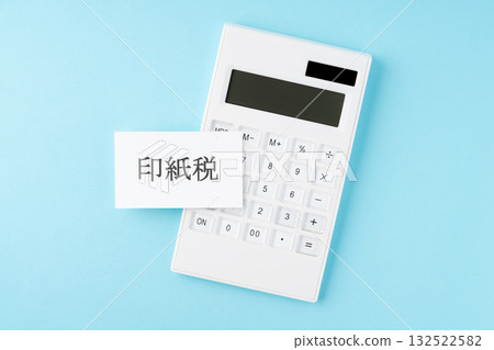 Stamp duty text and calculator on light blue background 132522582