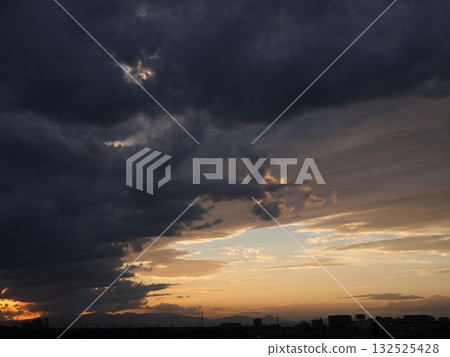 Sunset sky seen through the clouds Sunset sky seen through the clouds 132525428