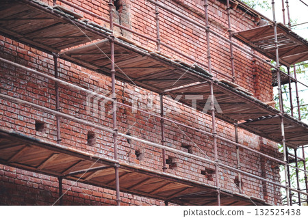 Restoration of an old brick building 132525438