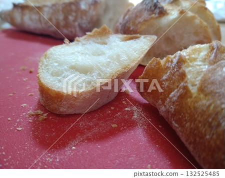 Delicious cut baguette Delicious cut baguette 132525485