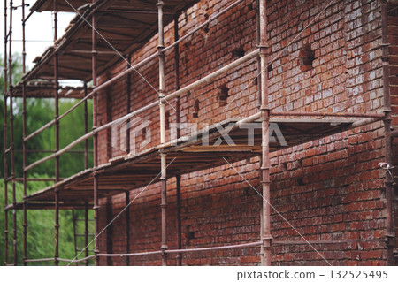 Restoration of an old brick building 132525495