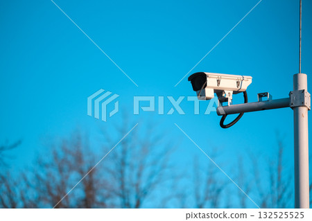 CCTV Camera on Blue Sky Background 132525525