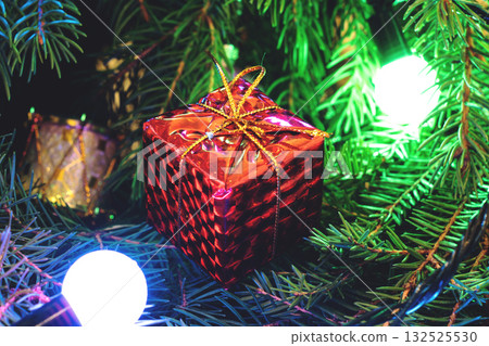 Red gifts under the Christmas tree 132525530