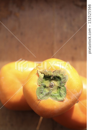 Ripe seedless persimmons: a taste of autumn Ripe seedless persimmons: a taste of autumn 132525566