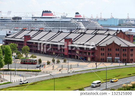 Two luxury cruise ships moored at Osanbashi Pier, visible beyond the Red Brick Warehouse Two luxury cruise ships moored at Osanbashi Pier, visible beyond the Red Brick Warehouse 132525800