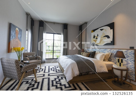 Stylish pale green and white bedroom in the master suite. Stylish pale green and white bedroom in the master suite. 132526135